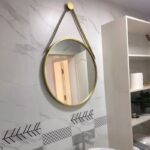 Decor mirror with hanging straps
