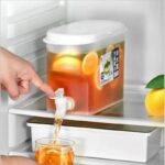 Fridge drink dispenser with tap