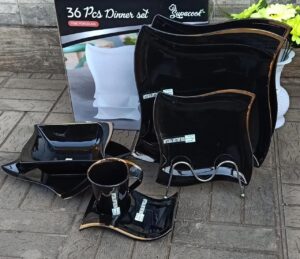 36pc black dinner set with gold rim