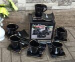Black 12pc cup and saucer set with gold rim