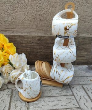 White marble cup set with bamboo stand and coasters.
